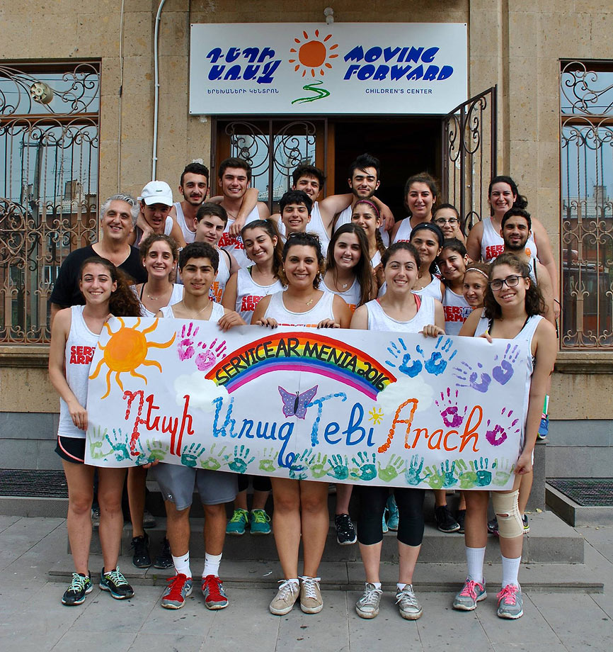 SERVICE Armenia 2016 participants at Debi Arach featuring the unique banner bearing all of the fingerprints of the children.